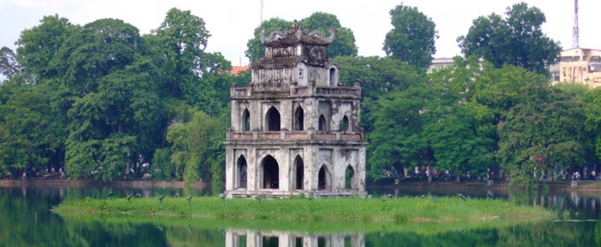 Turtle Tower standing on its islet in the middle of Hoan Kiem Lake, Hanoi
