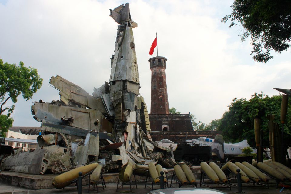 Wreckage of a downed aircraft piled into a monument in a Hanoi park
